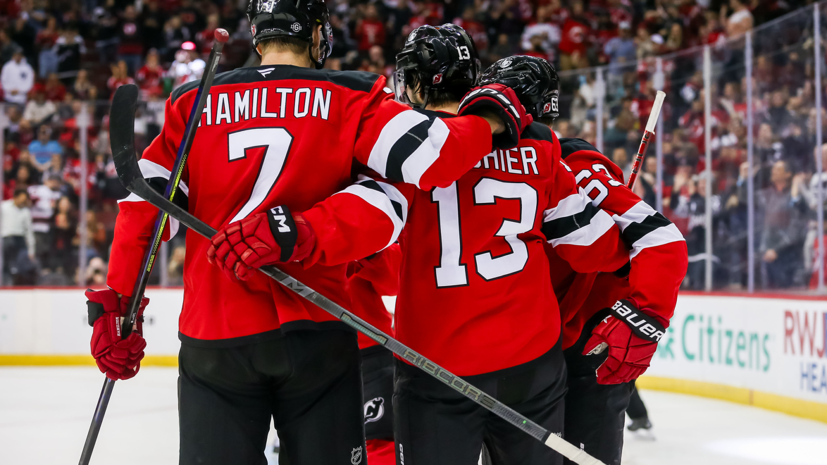 Dougie-Hamilton-Nico-Hischier-Devils.jpg
