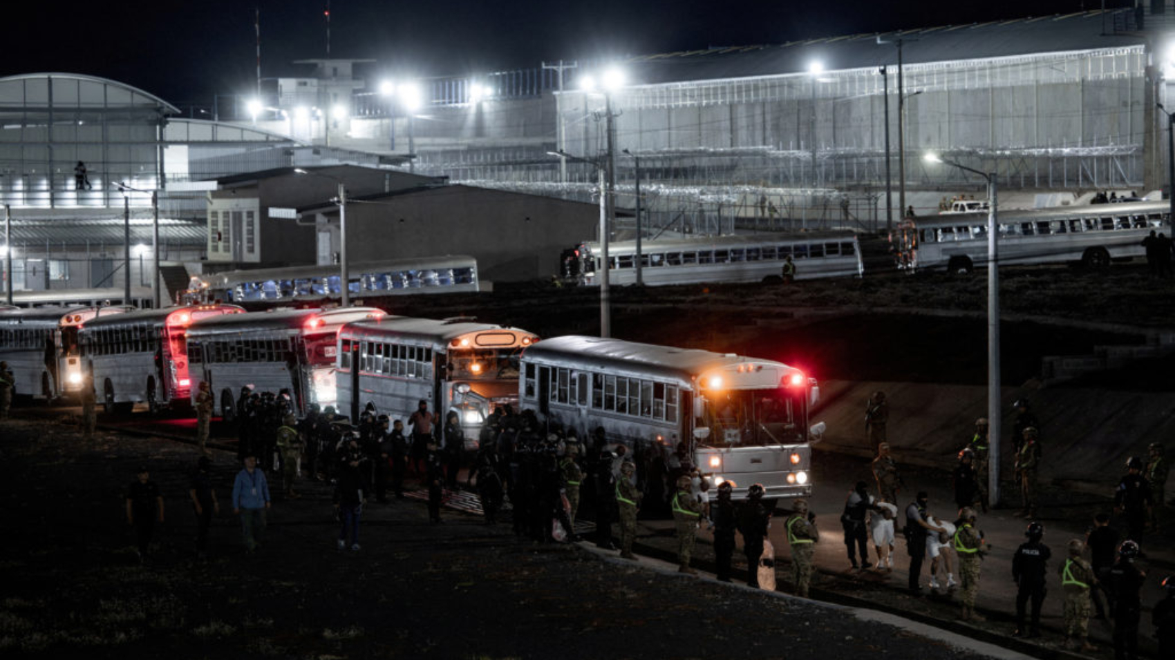 Salvadoran police officers escort alleged members of the Venezuelan gang Tren de Aragua recently deported by the U.S. government to be imprisoned in the Terrorism Confinement Center (CECOT) prison, as part of an agreement with the Salvadoran government, in Tecoluca, El Salvador, in this handout image obtained March 16, 2025. Secretaria de Prensa de la Presidencia/Handout via REUTERS ATTENTION EDITORS - THIS IMAGE HAS BEEN SUPPLIED BY A THIRD PARTY. NO RESALES. NO ARCHIVES     TPX IMAGES OF THE DAY