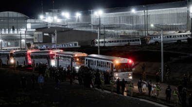 Salvadoran police officers escort alleged members of the Venezuelan gang Tren de Aragua recently deported by the U.S. government to be imprisoned in the Terrorism Confinement Center (CECOT) prison, as part of an agreement with the Salvadoran government, in Tecoluca, El Salvador, in this handout image obtained March 16, 2025. Secretaria de Prensa de la Presidencia/Handout via REUTERS ATTENTION EDITORS - THIS IMAGE HAS BEEN SUPPLIED BY A THIRD PARTY. NO RESALES. NO ARCHIVES     TPX IMAGES OF THE DAY