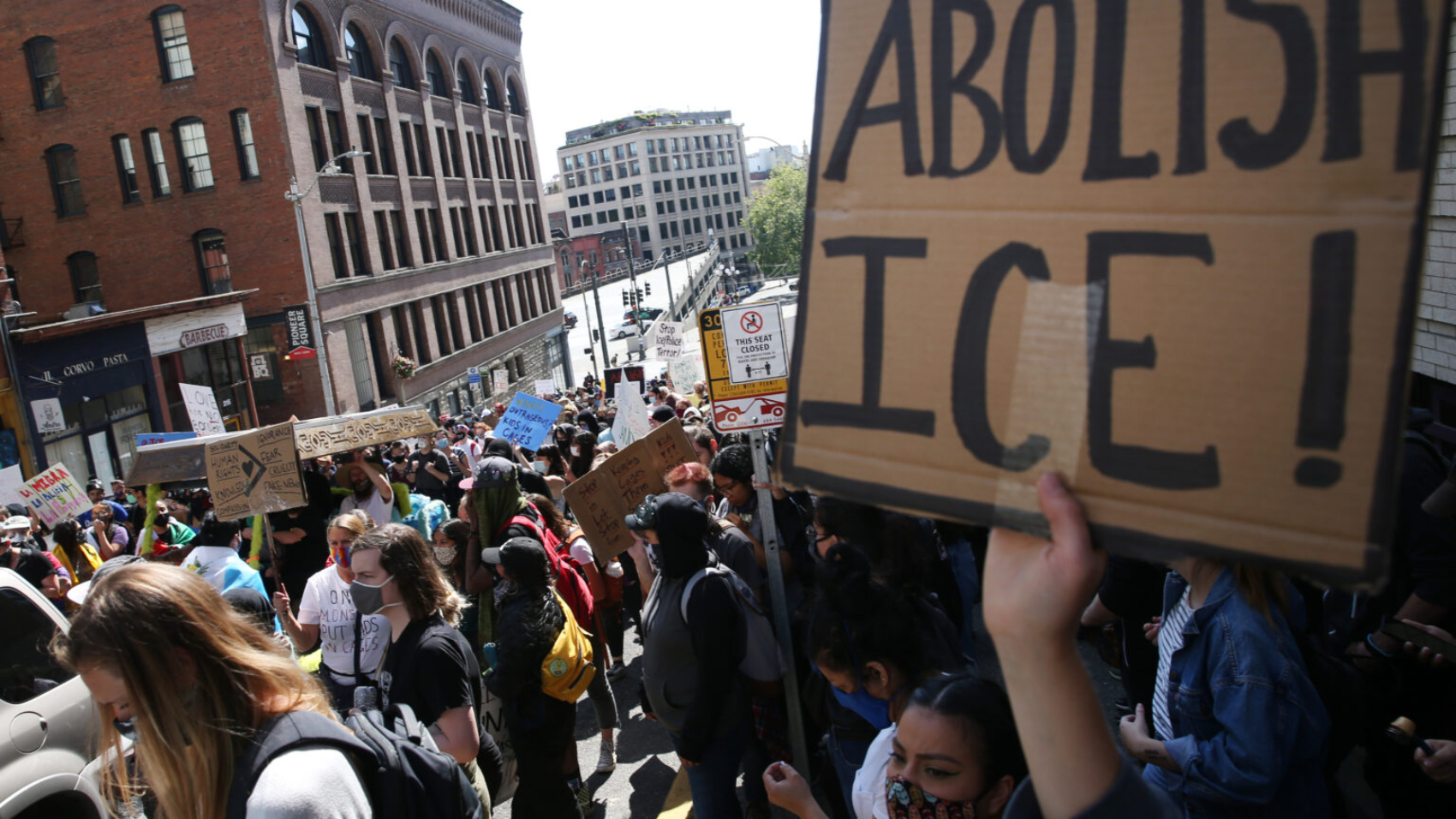 SEATTLE, WA - JULY 12: Protesters rally on the street on July 12, 2020 in Seattle, Washington. Protesters called for the abolishment of U.S. Immigration and Customs Enforcement (ICE) and the closure of detention centers.  (Photo by Karen Ducey/Getty Images)