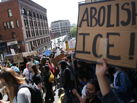 SEATTLE, WA - JULY 12: Protesters rally on the street on July 12, 2020 in Seattle, Washington. Protesters called for the abolishment of U.S. Immigration and Customs Enforcement (ICE) and the closure of detention centers.  (Photo by Karen Ducey/Getty Images)
