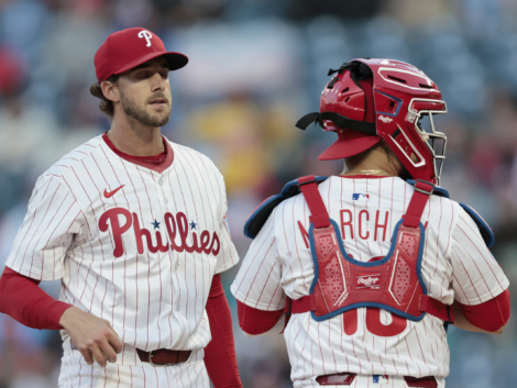 Phils pitcher Aaron Nola and catcher Rafael Marchan wait for a coach during a meeting on the mound in the first inning of the San Francisco Giants at Philadelphia Phillies Major League Baseball game at Citizens Bank Park in Philadelphia on Wednesday, April 16, 2025.