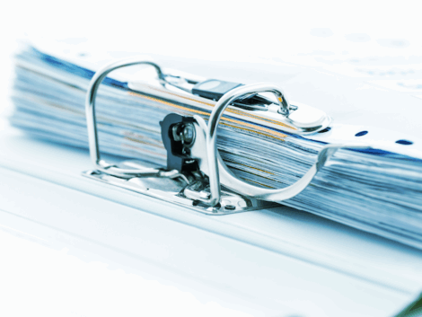 detail-of-open-folder-filled-with-documents-in-cya-2025-01-10-12-40-22-utc