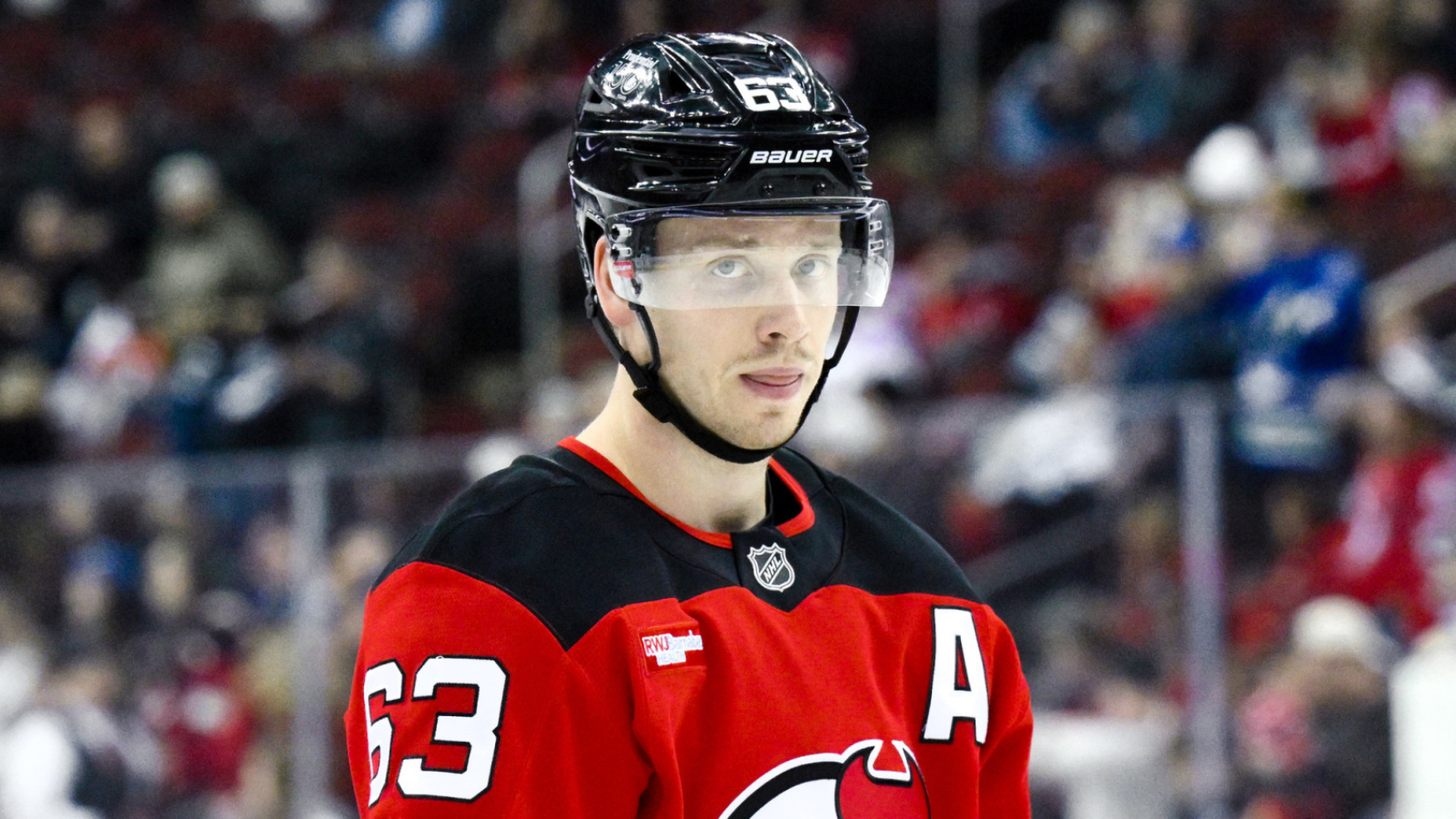 Mar 24, 2025; Newark, New Jersey, USA; New Jersey Devils left wing Jesper Bratt (63) warms up before a game against the Vancouver Canucks at Prudential Center. Mandatory Credit: John Jones-Imagn Images