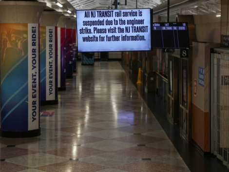 A signage displays a warning of no transit service in New Jersey due to a planned strike in New York's Penn Station in New York, U.S., May 16, 2025. REUTERS/Jeenah Moon