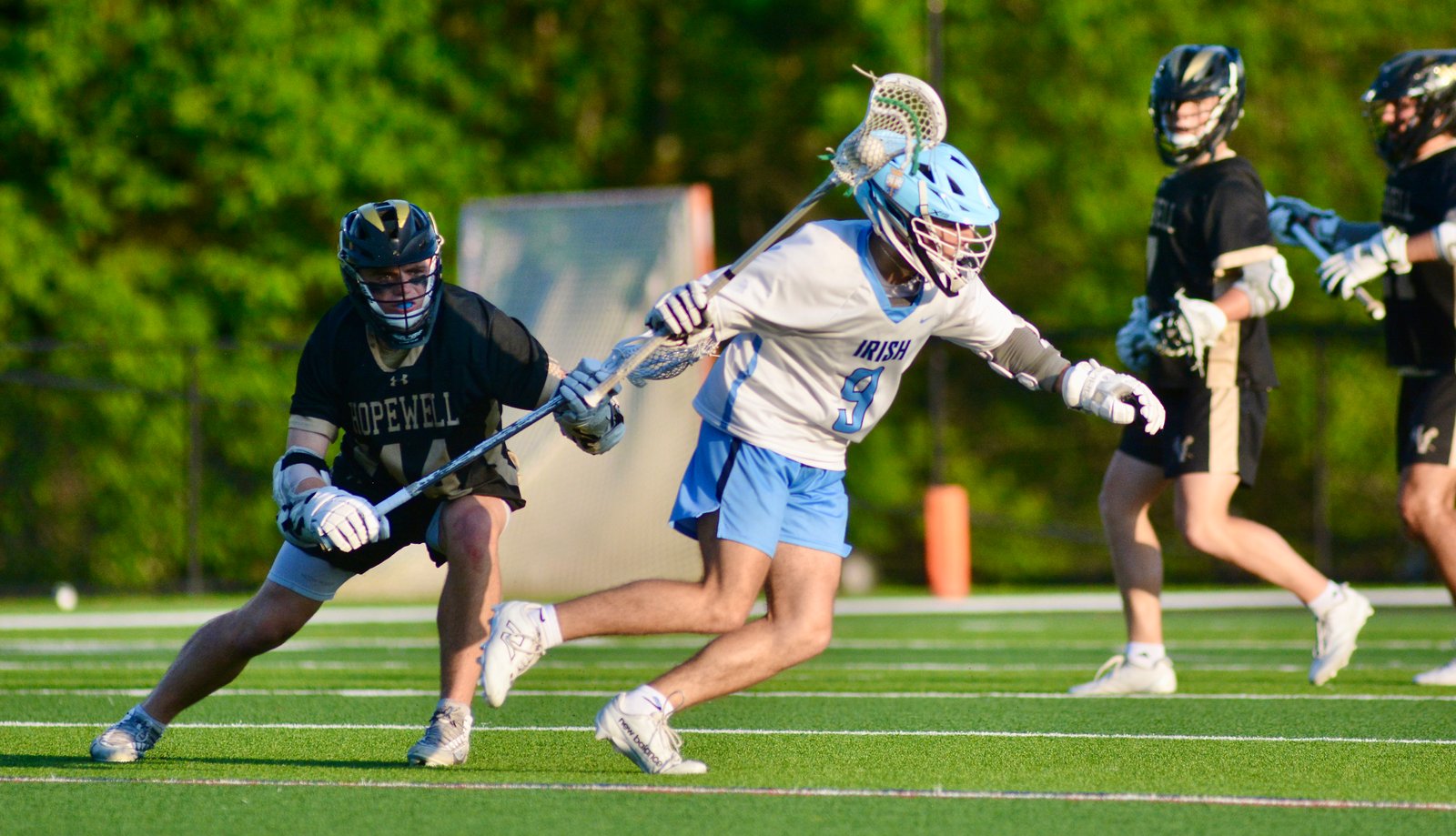 Notre Dame’s Caden Federigo, right, scoop up the ball and...