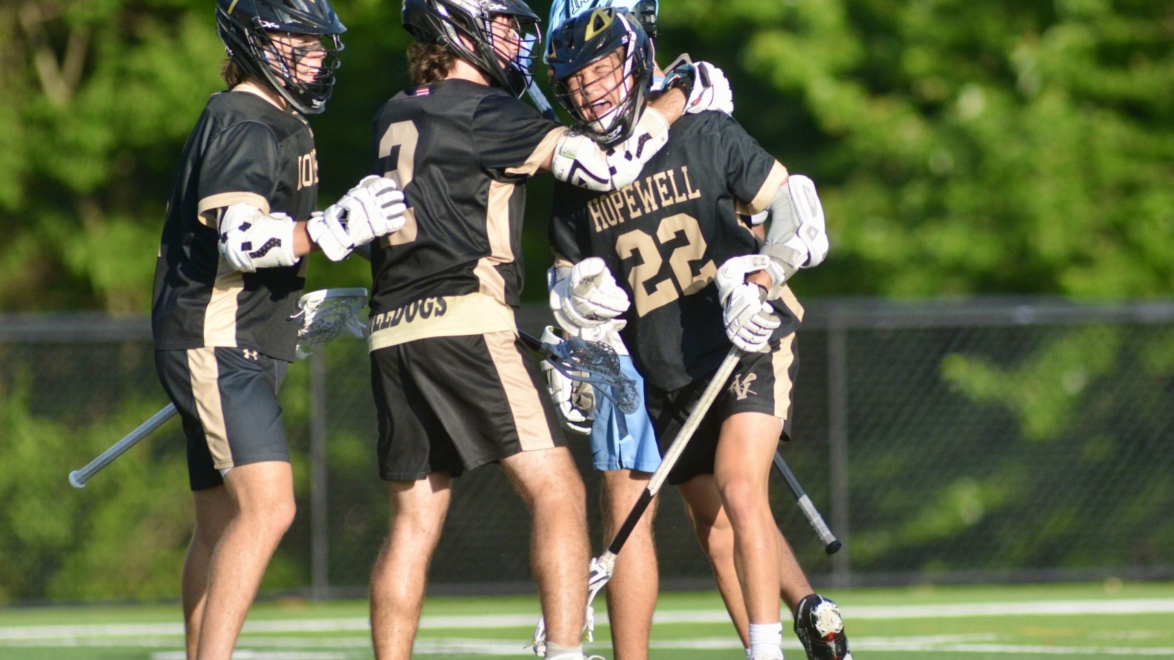 Hopewell Valley’s Luke Caldwell, right, celebrates his goal with teammates...