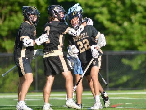 Hopewell Valley’s Luke Caldwell, right, celebrates his goal with teammates...