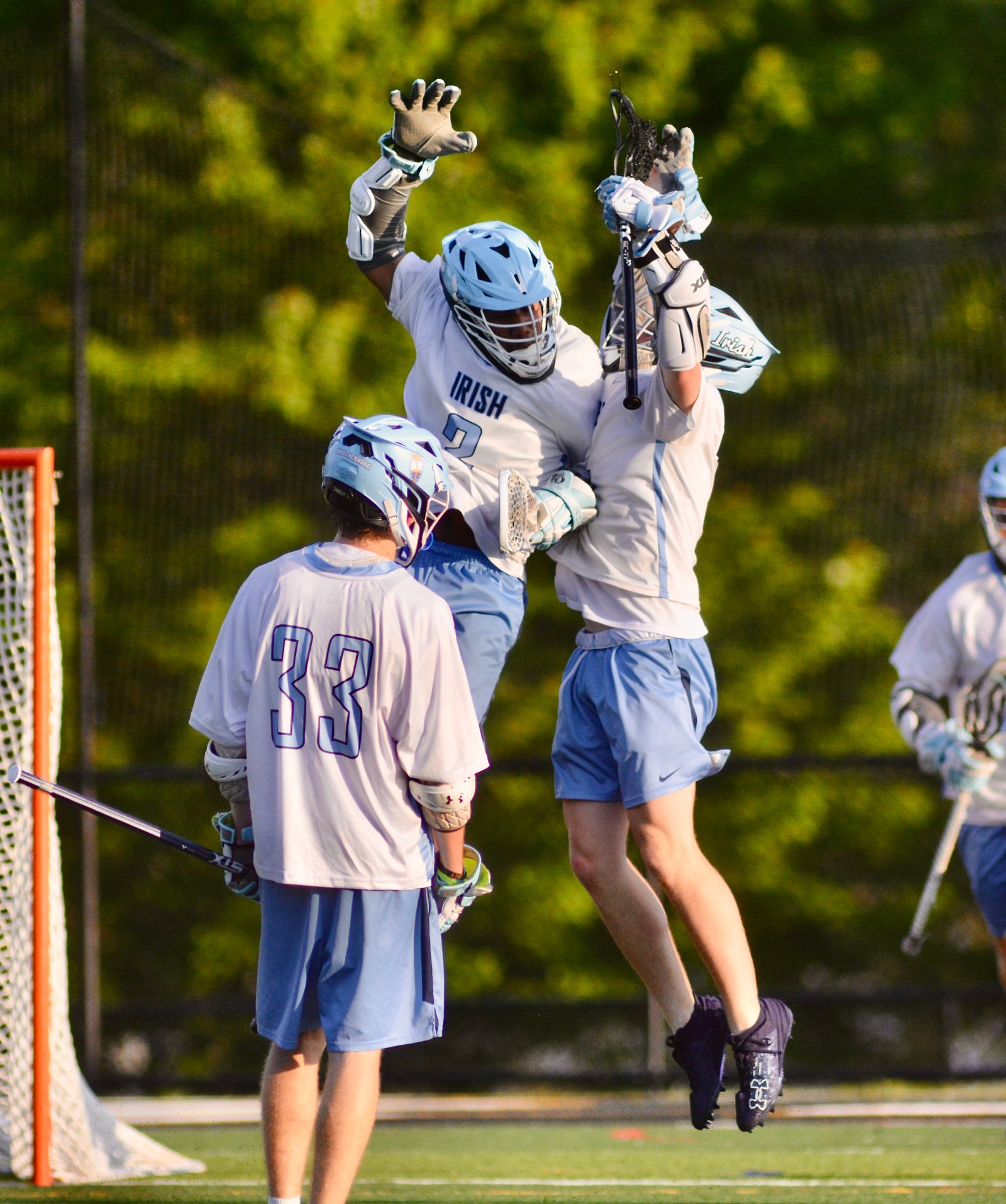 Notre Dame’s Merritt Long, left, celebrates his goal with teammate...