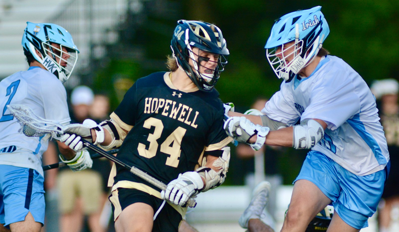 Hopewell Valley’s Johnny Ellis, left, tries to move past the...
