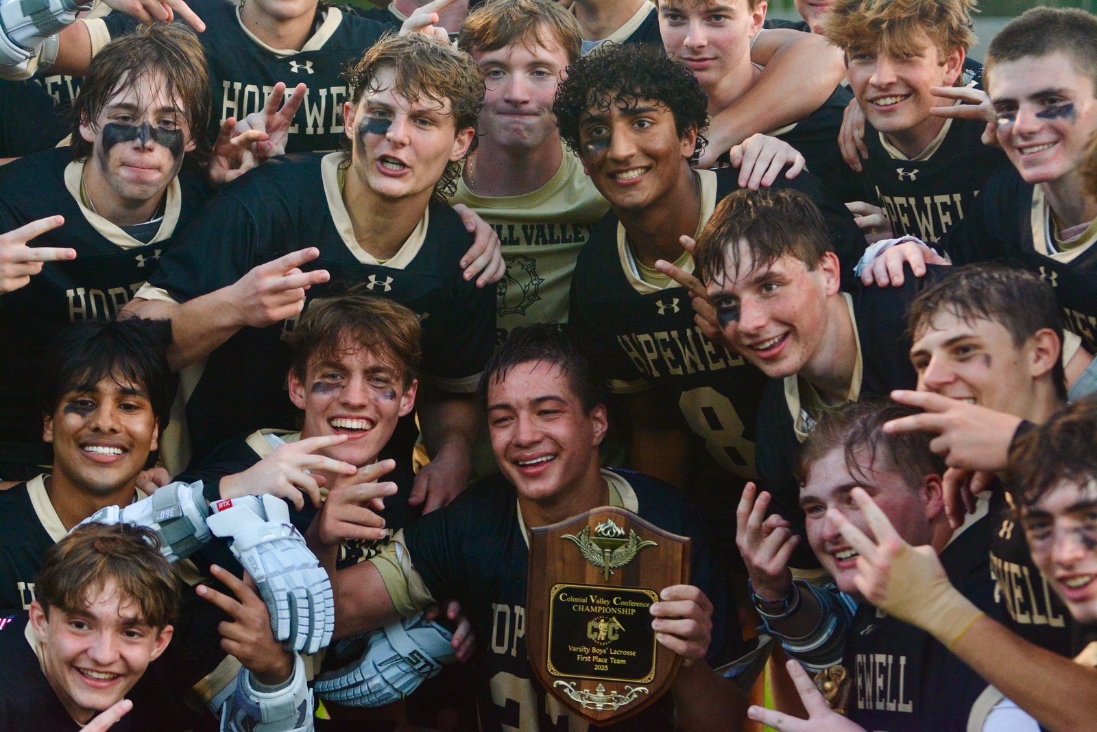 Hopewell Valley players pose for a photo with the championship...