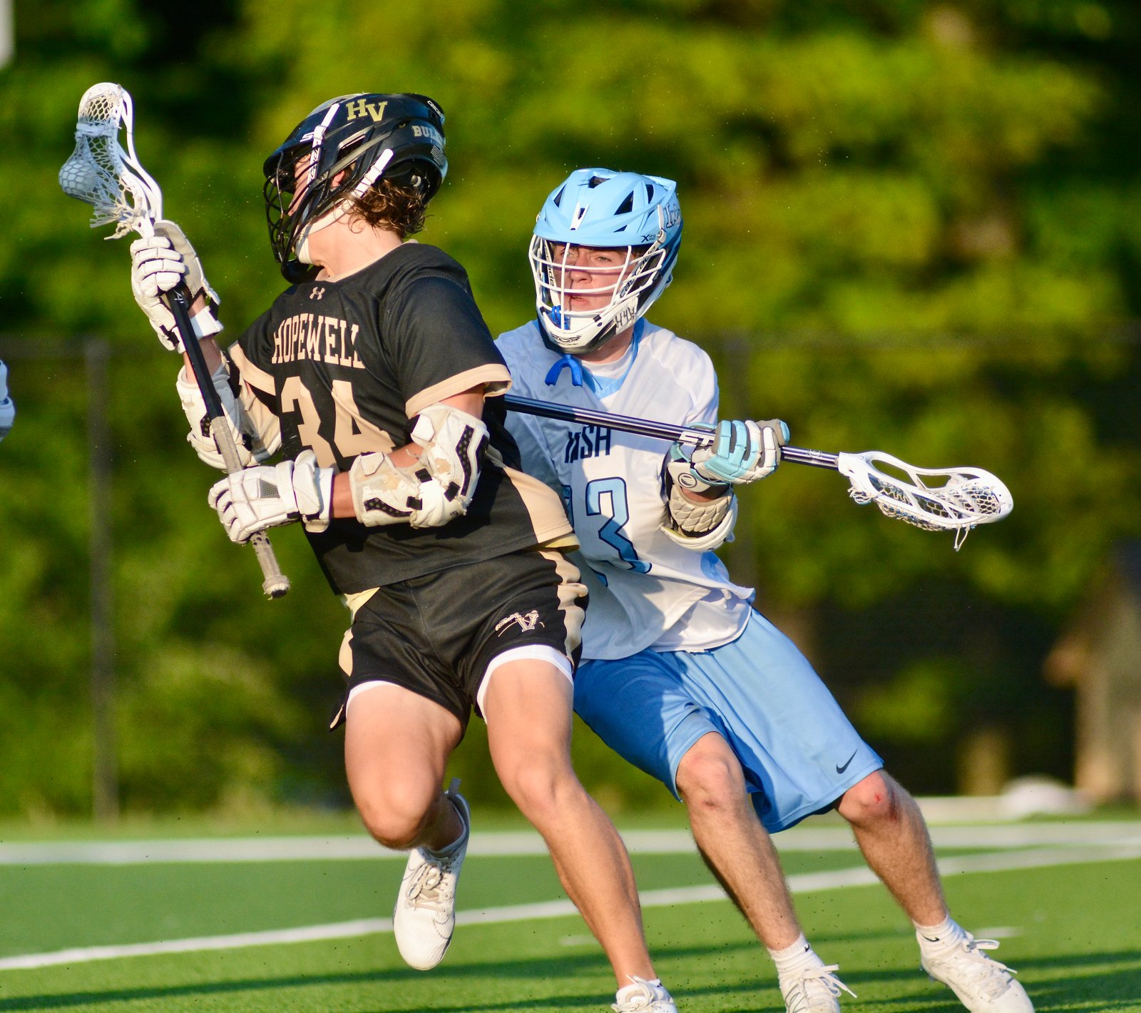 Hopewell Valley’s Johnny Ellis, left, spins as he’s defended by...