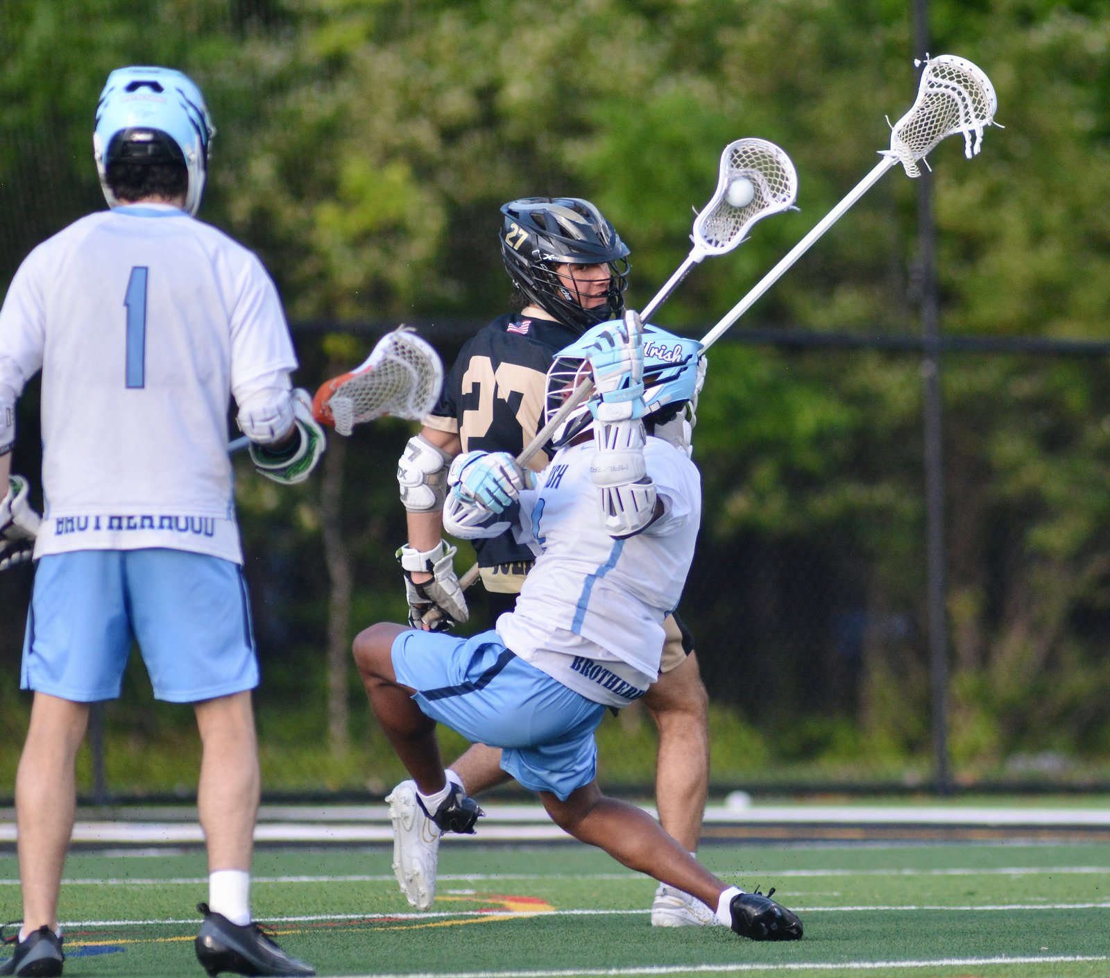 Notre Dame’s Merritt Long, 3, shoots the bal as he’s...