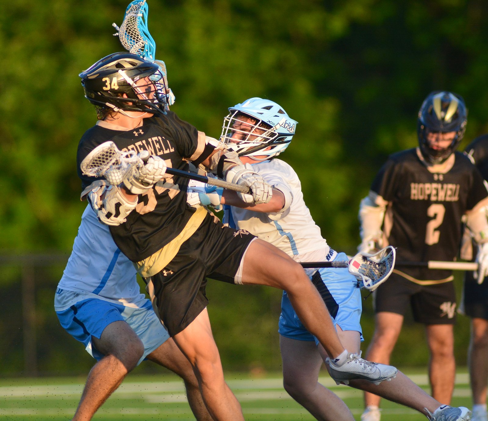 Hopewell Valley’s Johnny Ellis, left, is checked by Notre Dame’s...