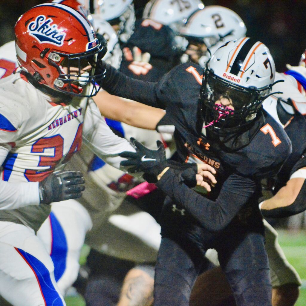 Pennsbury wide receiver Aiden Kitchenman, right, blocks against Neshaminy linebacker...