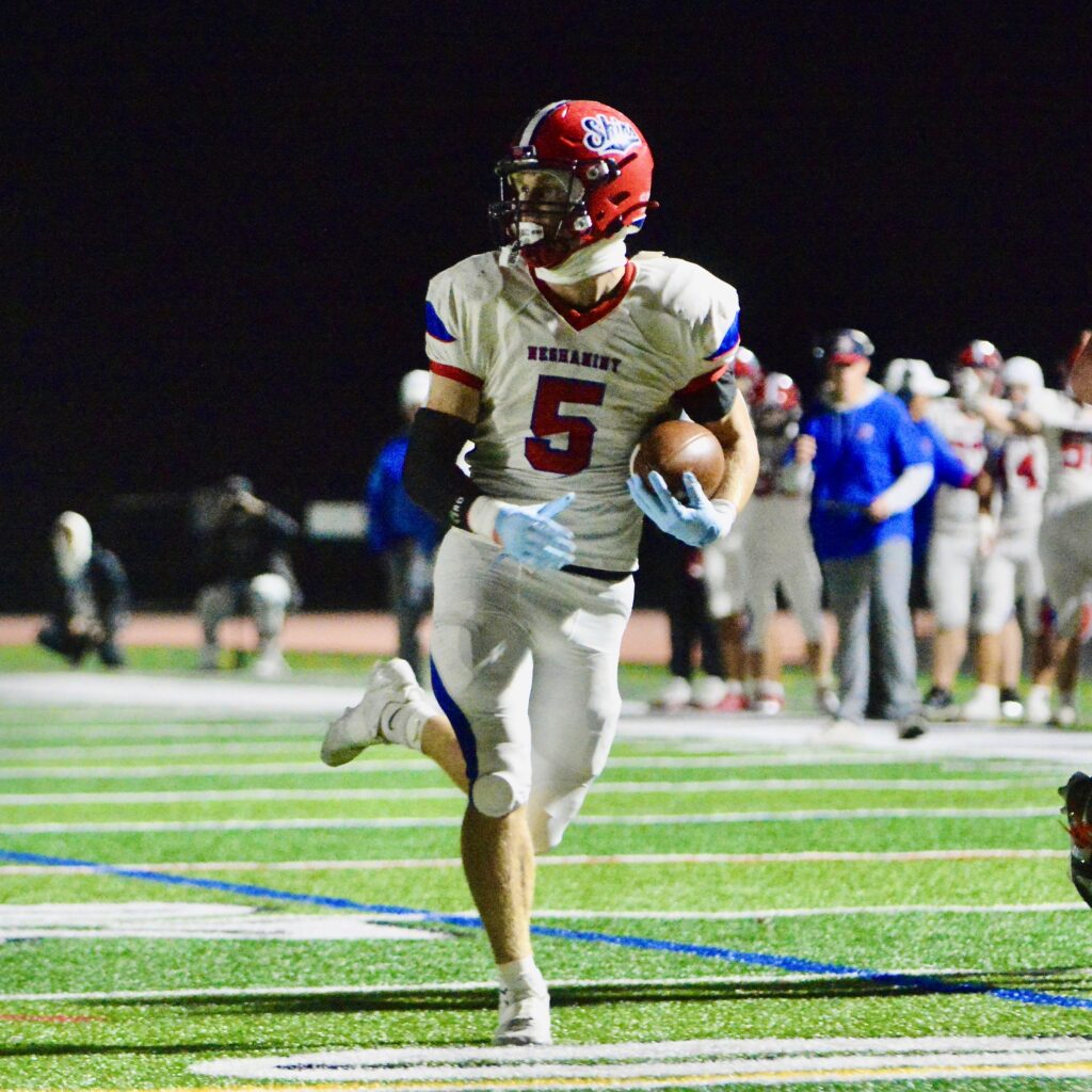 Neshaminy running back Carter Clee runs to the end zone...