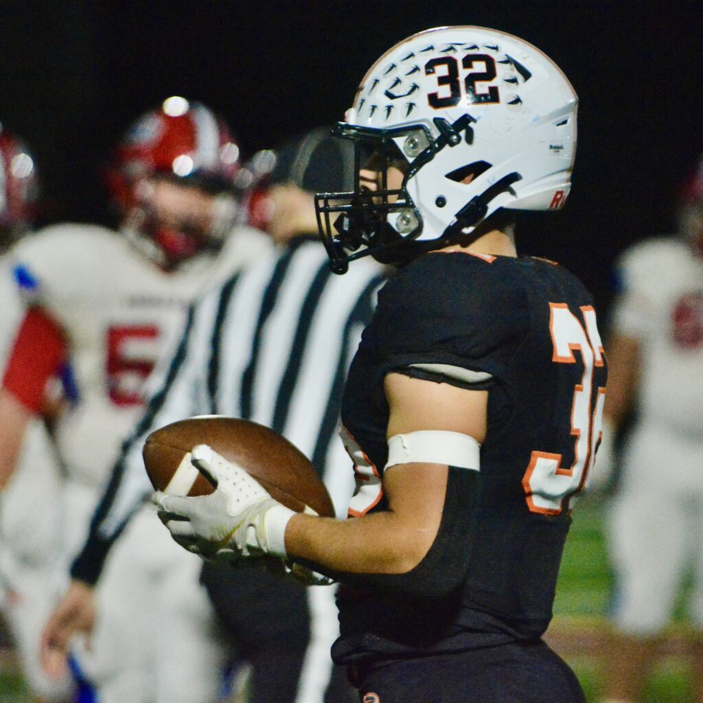 Pennsbury linebacker Justin LaRue-Madison, 32, holds the ball after recovering...