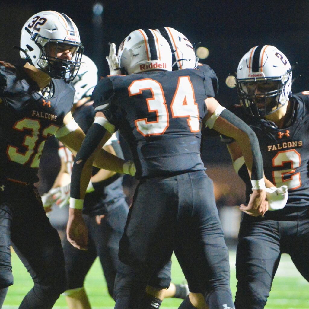 Pennsbury running back Luke Beighley, 34, celebrates with teammates Justin...