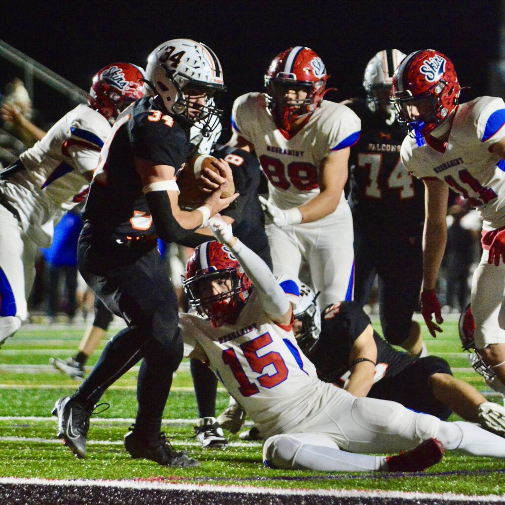 Pennsbury running back Luke Beighley, 34, breaks away from Neshaminy...
