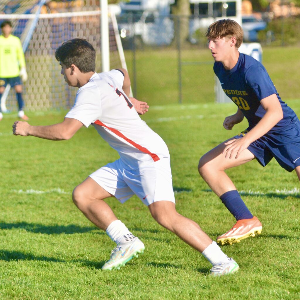 Pennington’s Hugo Thomas Gonzalez, left, tries to move away from...