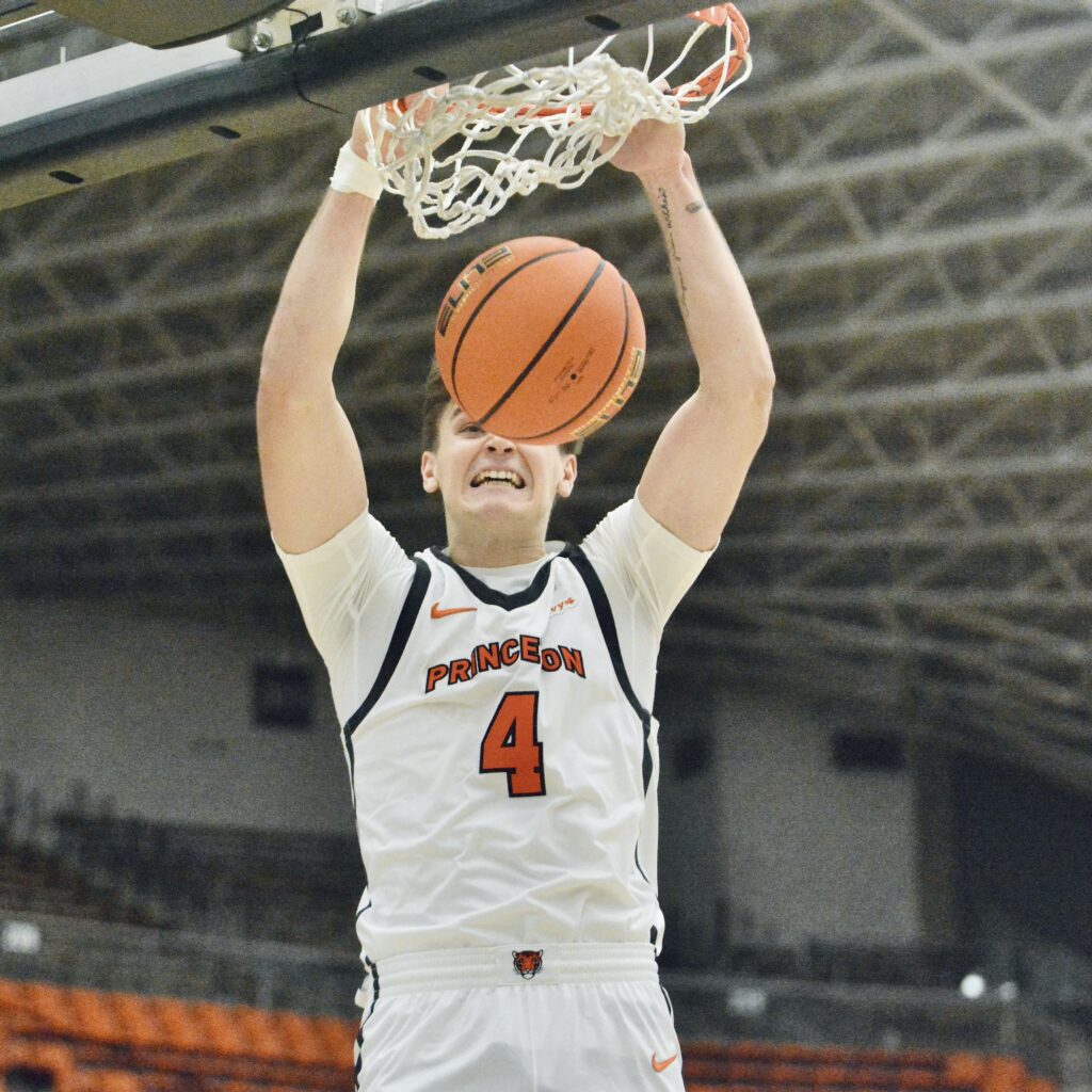 Princeton’s CJ Happy dunks the ball against Bucknell during an...